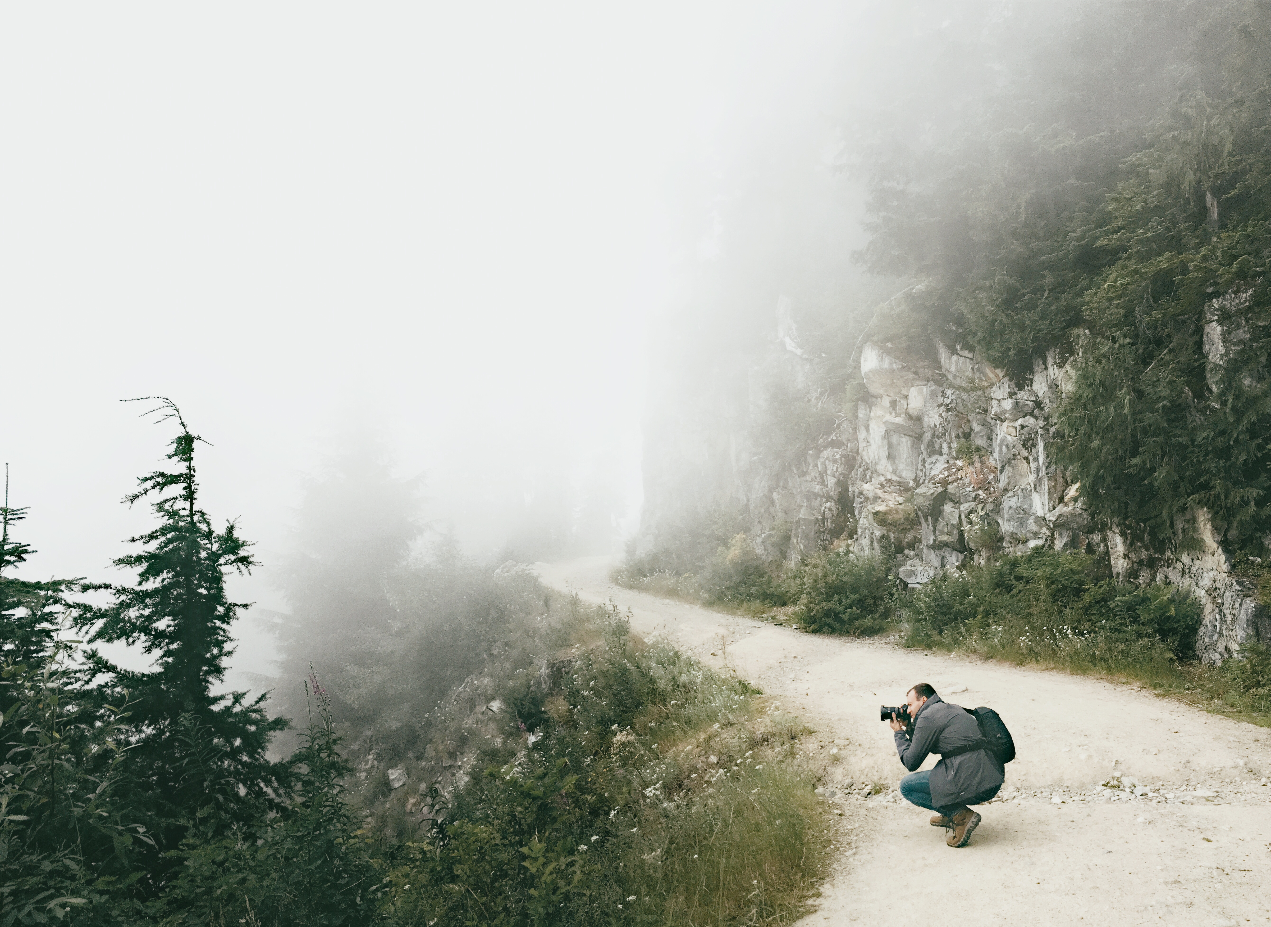 Taking photos of the fog on Grouse Mountain