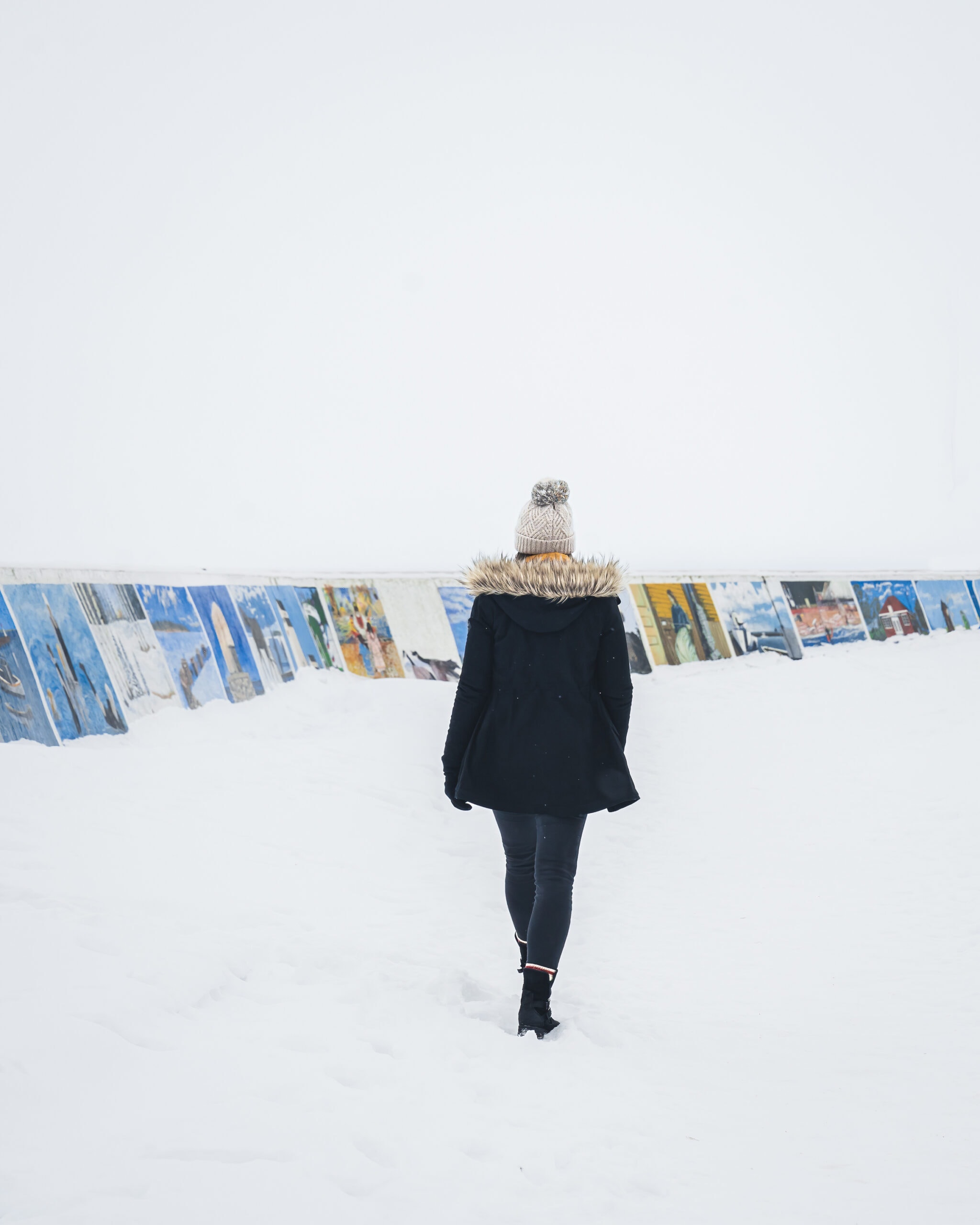 Walking along the seawall murals in Gimli Manitoba winter