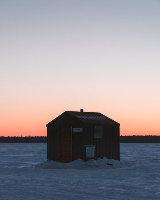 lake winnipeg hecla island ice fishing shack sunrise