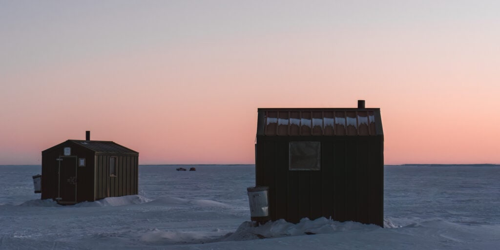 lake winnipeg hecla island ice fishing shacks sunrise