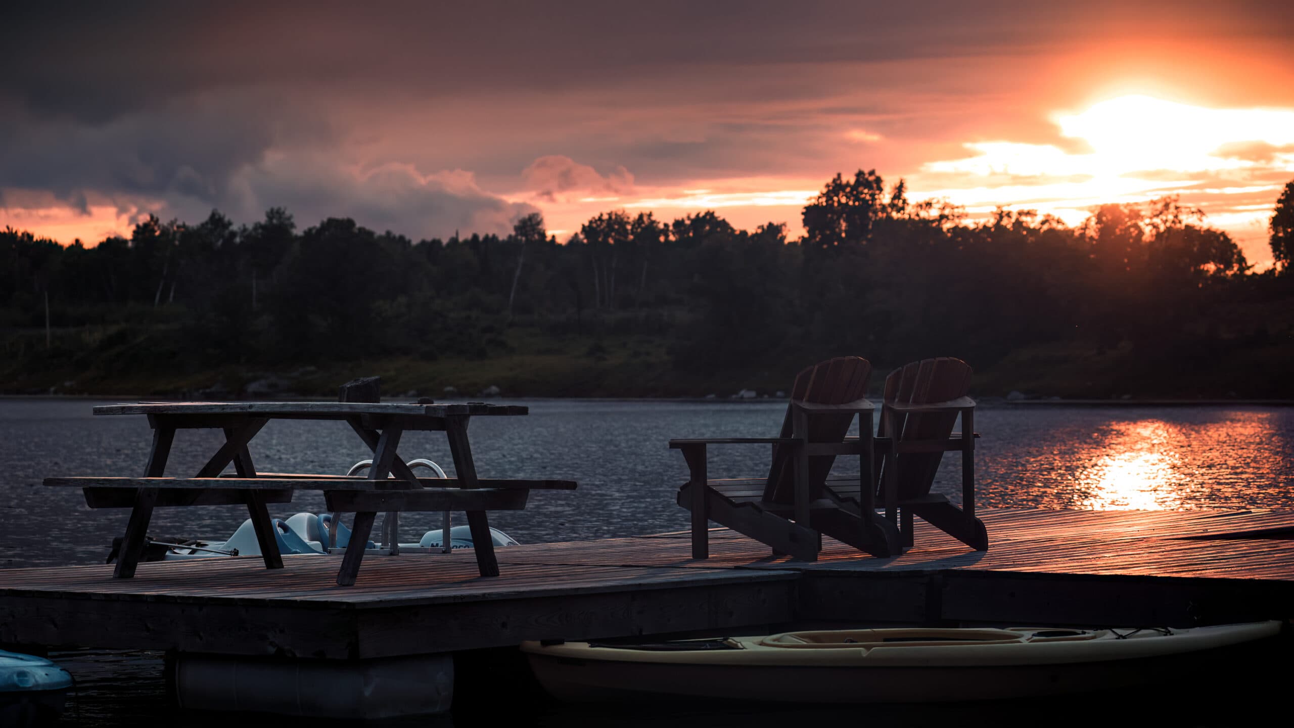 Kenora Wild Woods Hideaway dock views at sunset