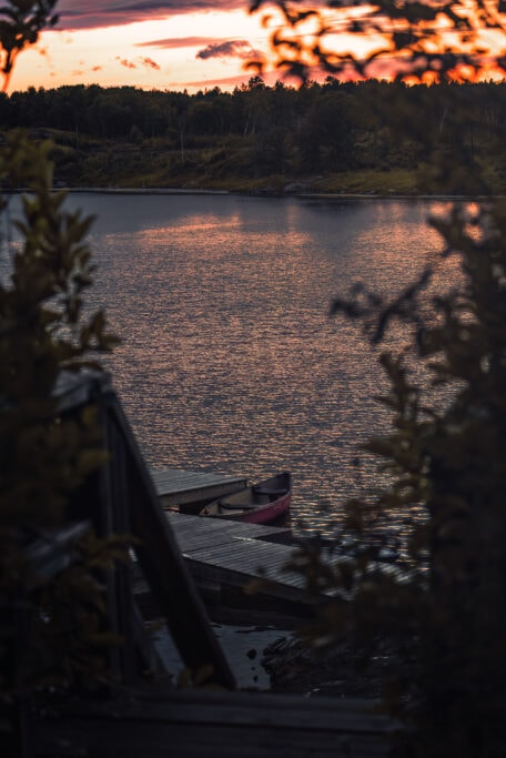 Kenora Wild Woods Hideaway view of the dock at sunset